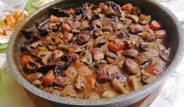 Iepure cu vin alb și legume la cuptor