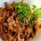Pulled pork (carne de porc zdrențuită) pregătită la slow coocker