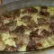 Carne de porc suculentă cu orez la cuptor