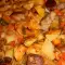 Carne de porc cu cartofi la cuptor